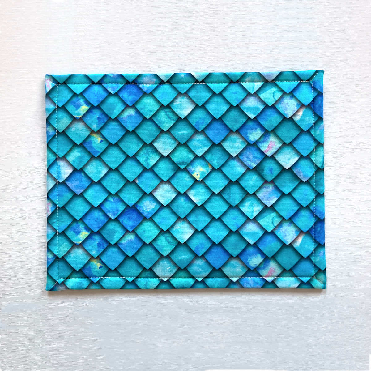 Back of project bag showing turquoise mermaid/dragon scale print