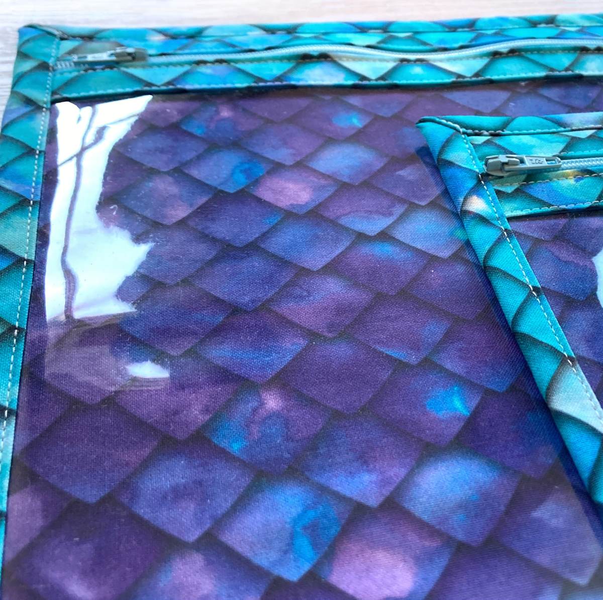 Dragon scales project pouches showing  clear vinyl window front