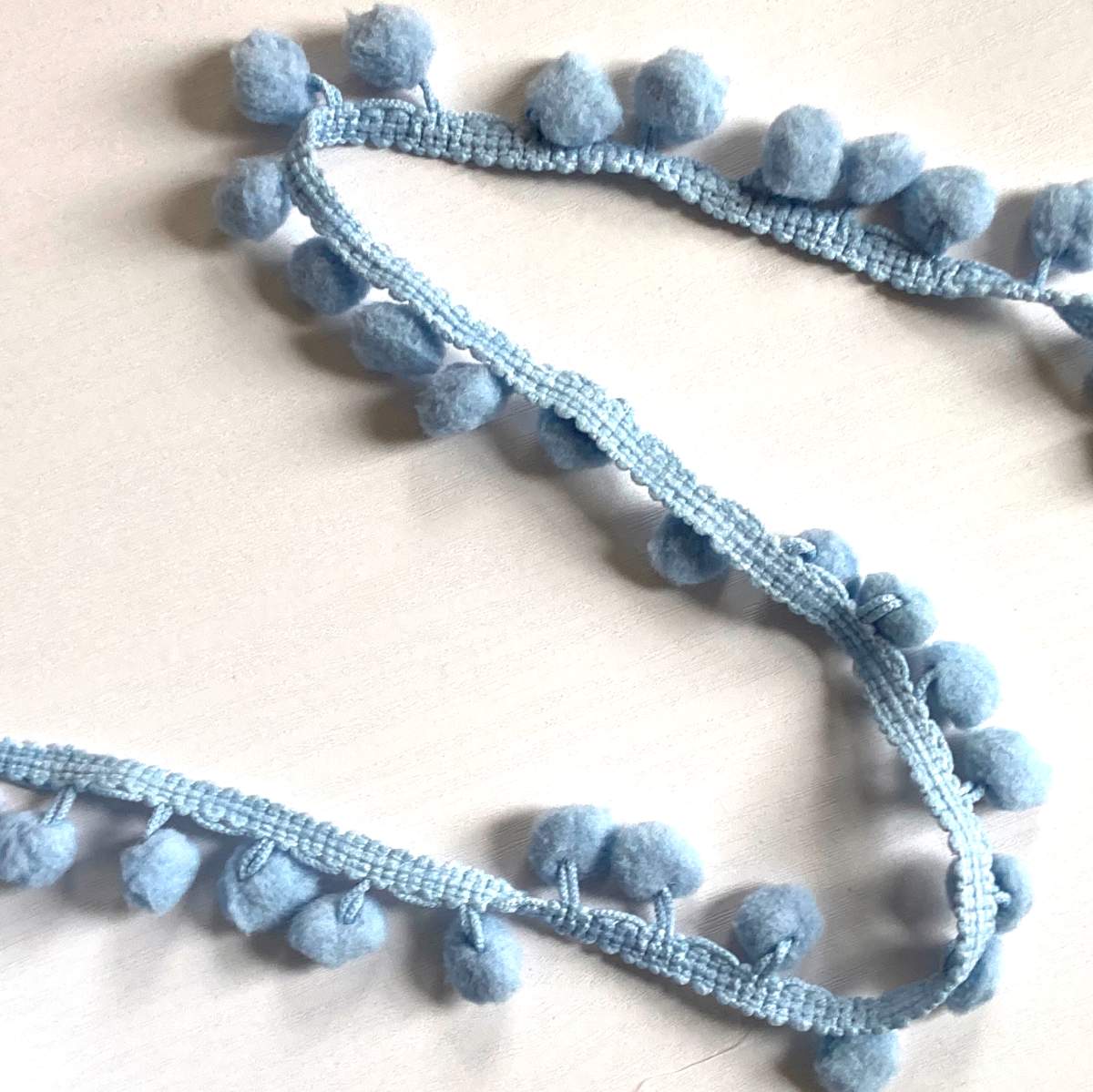 Baby blue pom pom trim
