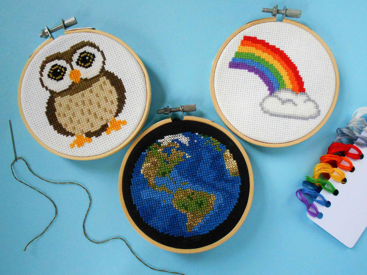 Owl, earth and rainbow cross stitch kits with threads