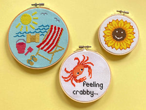 Summery cross stitch kits - featuring beach, crab and sunflower cross stitches