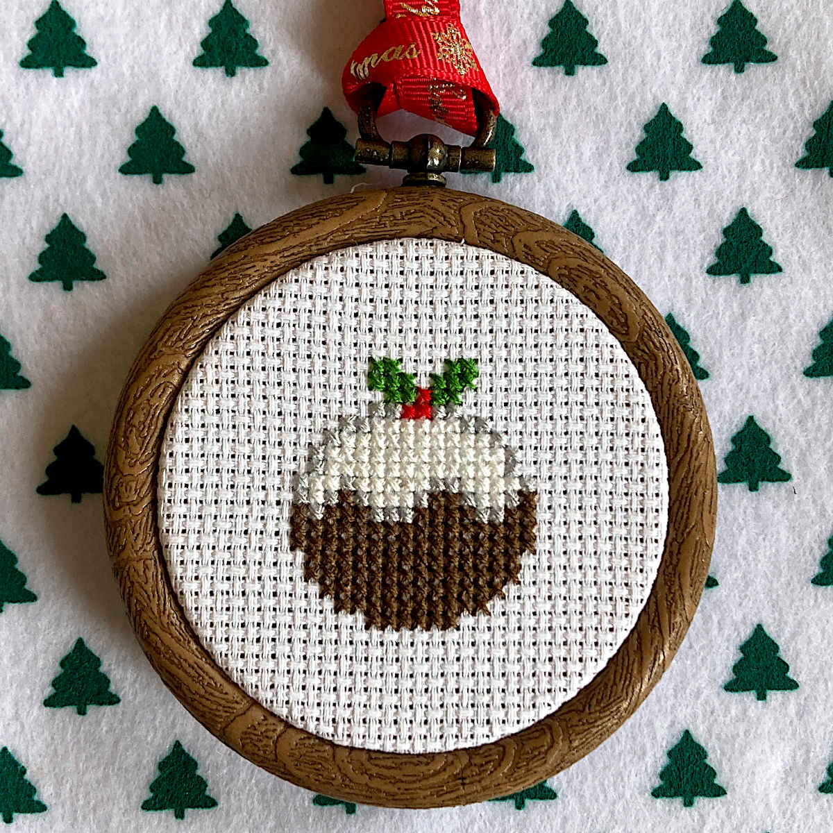 Cross stitch Christmas ornament of a British Christmas Pudding