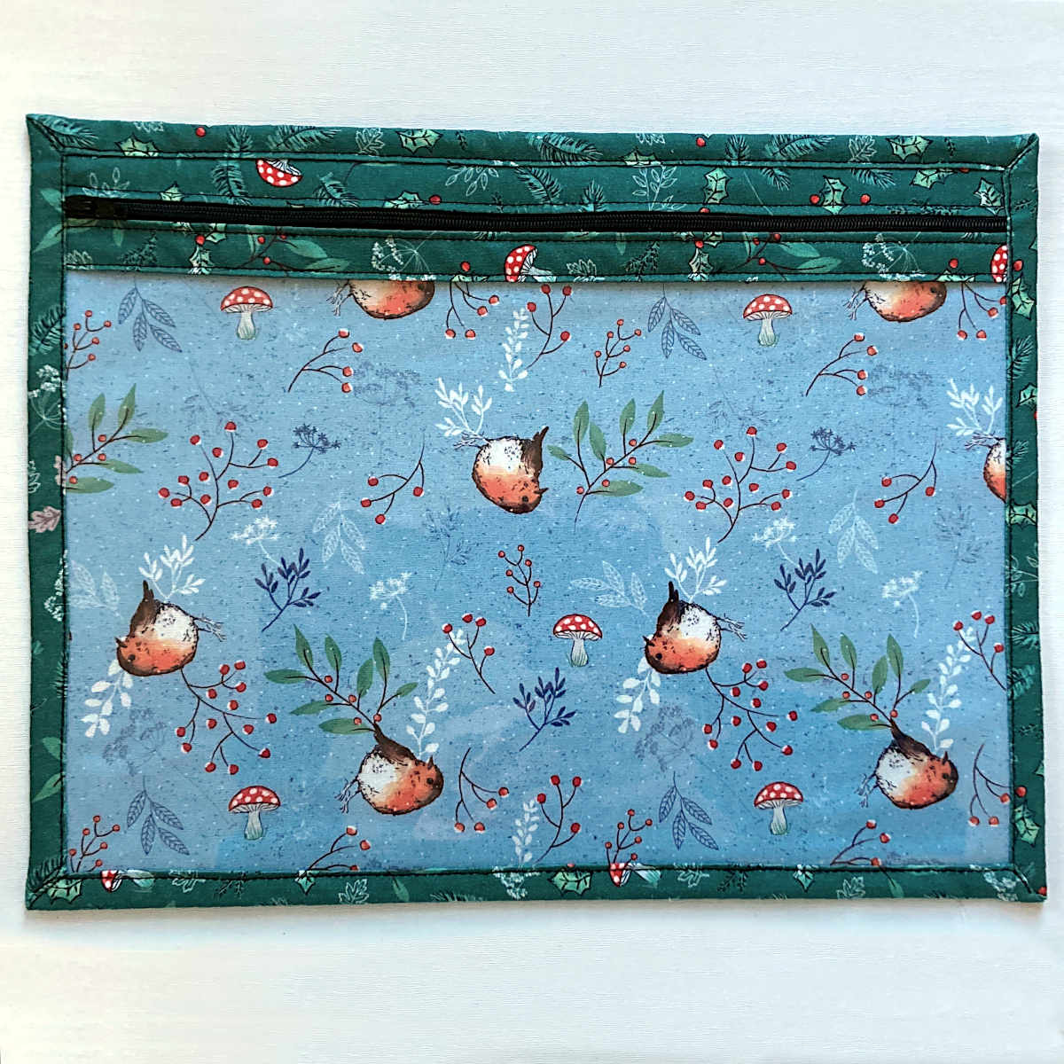 Large project bag with green foliage outer fabric, vinyl & zip front and robin lining fabric