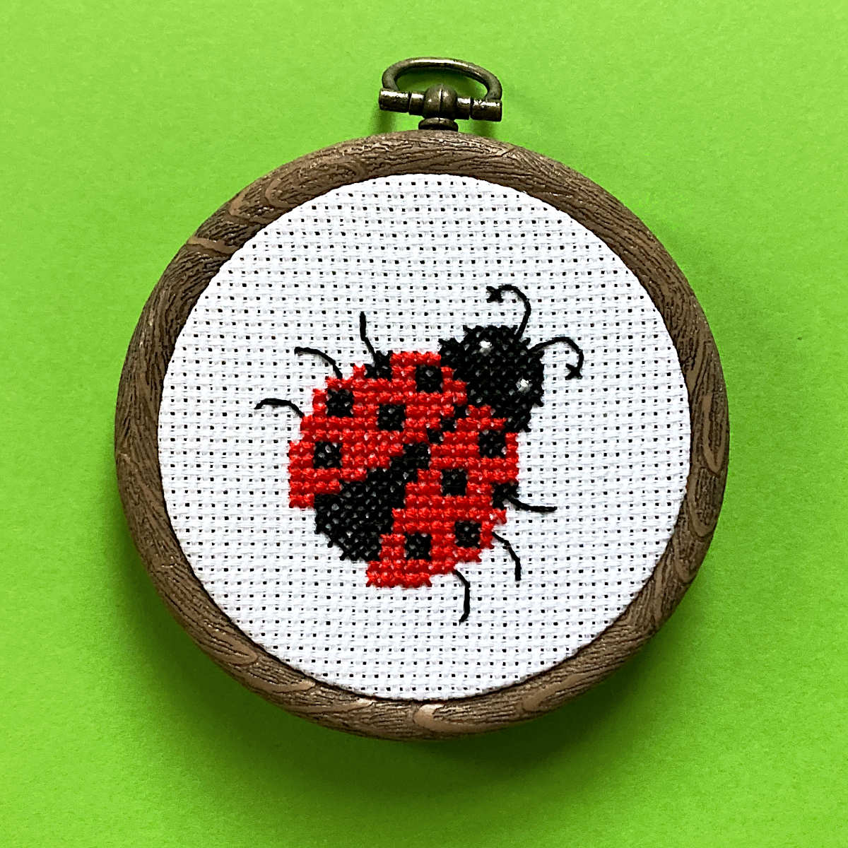 Ladybird cross stitch insect in 3 inch hoop